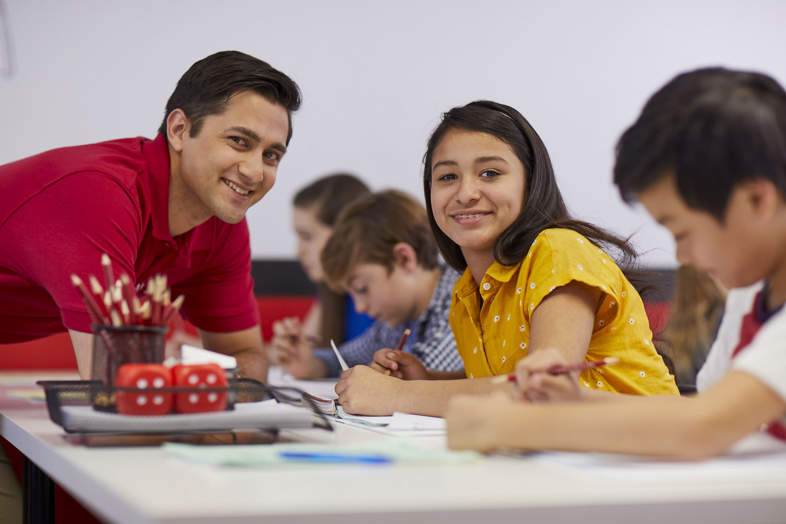 Math tutor helping student understand new concepts