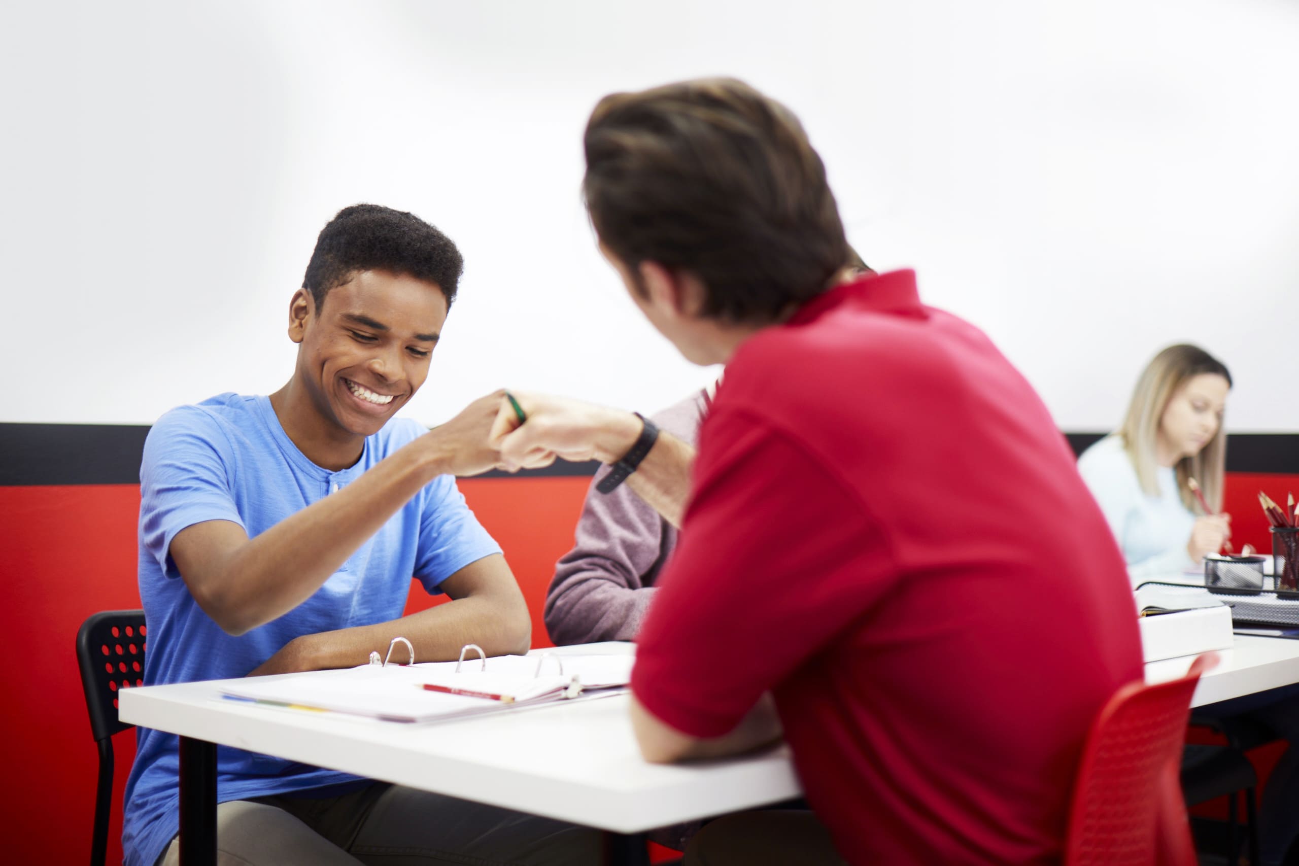 High school student learning advanced calculus with tutor support