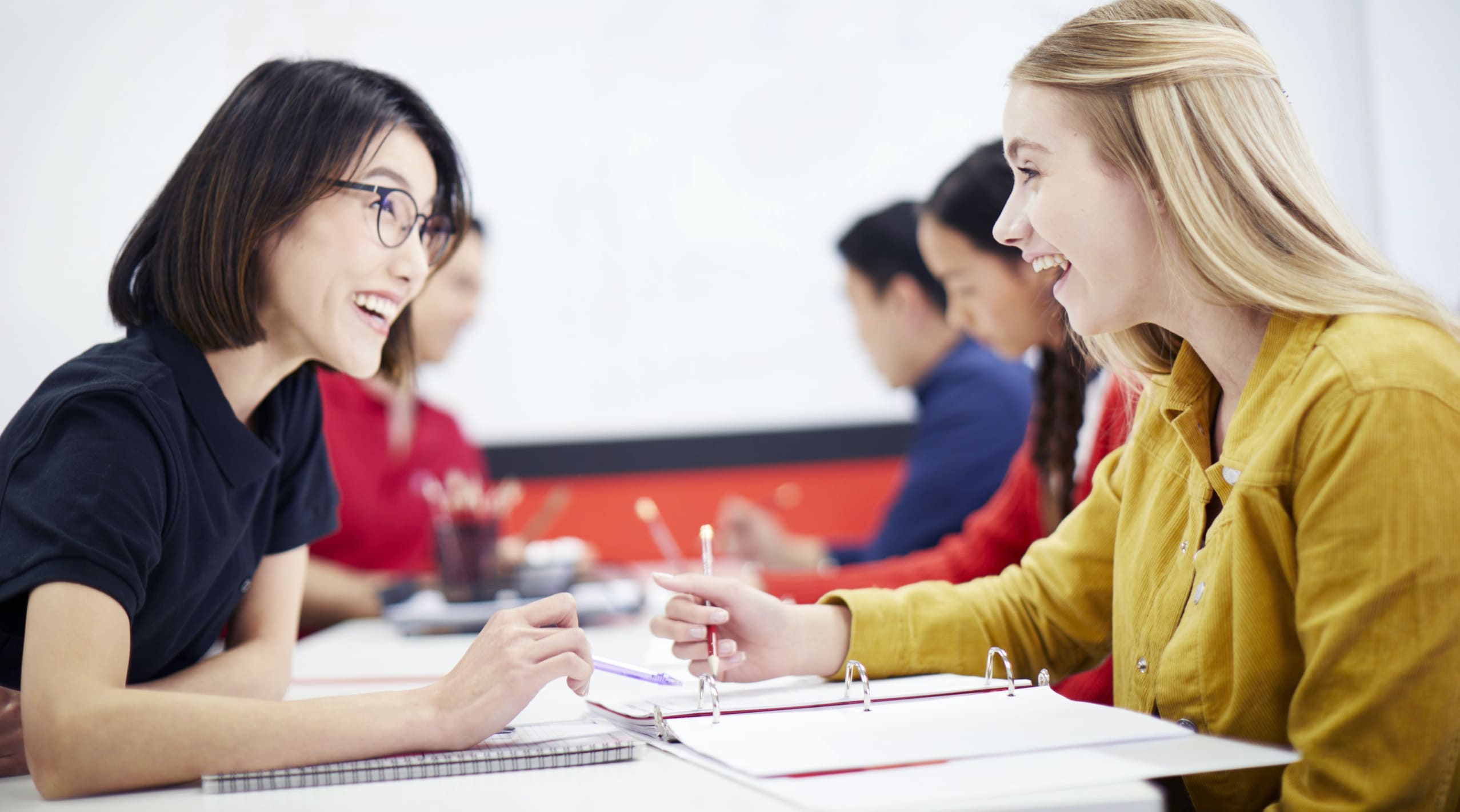 Focused student learning algebra 2 with a math tutor