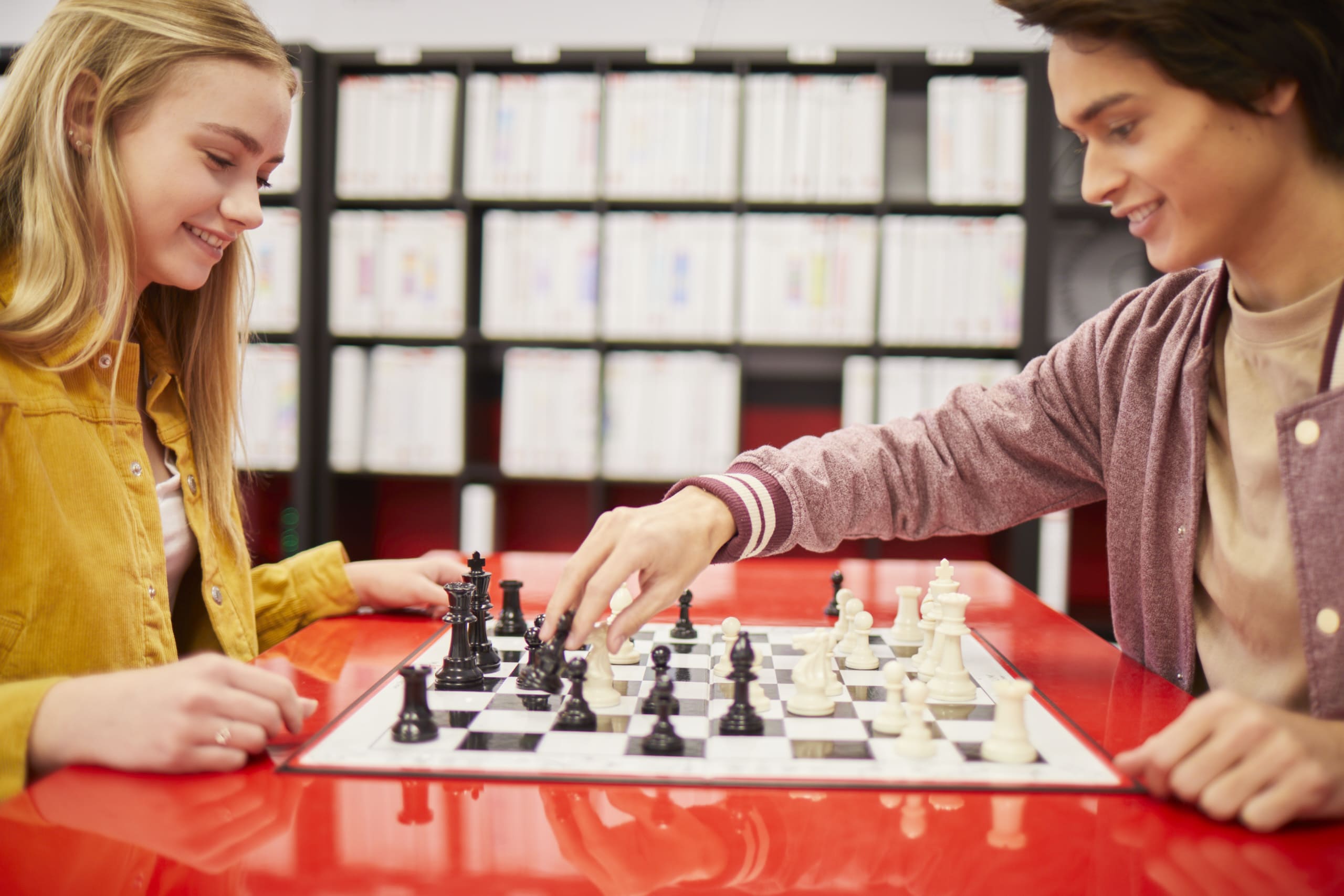 Students playing chess.