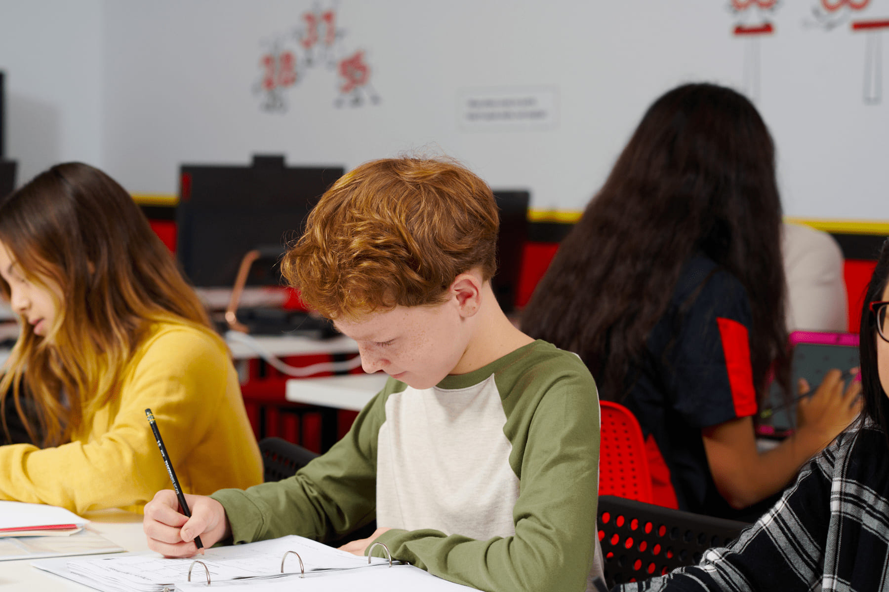 A young boy learning math.