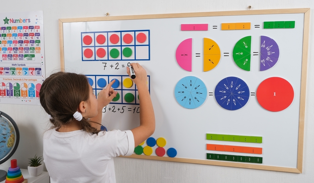 An elementary school student solving a visual math task, demonstrating problem-solving skills