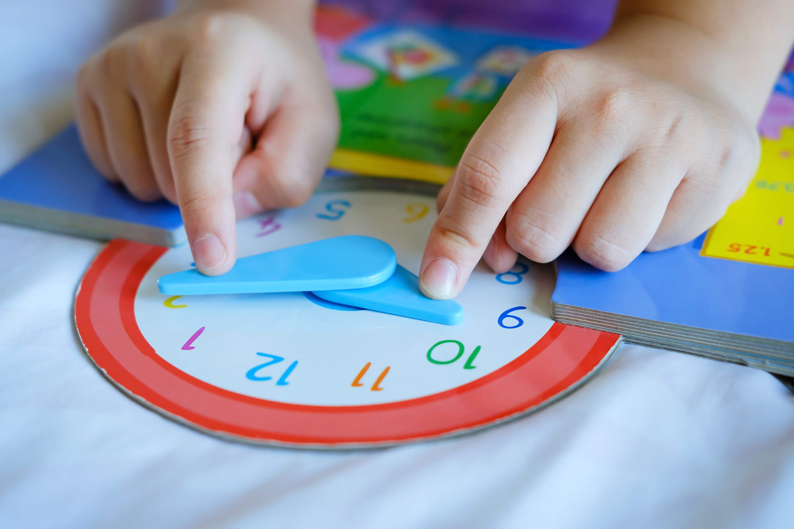 Analog Clocks Teach Both Time and Fractions